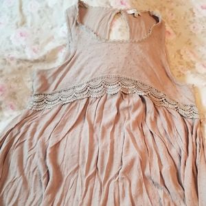 Lightweight sleeveless tunic length blouse